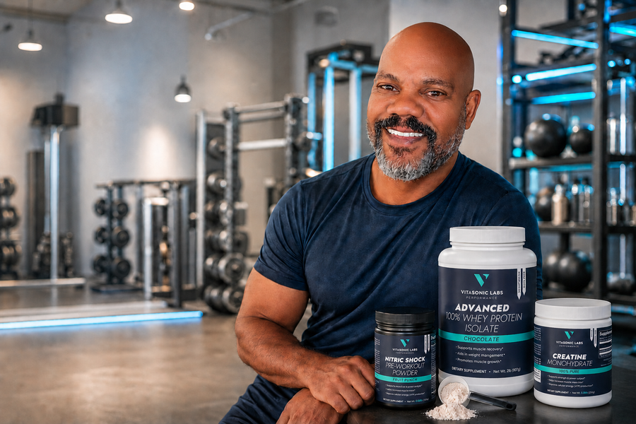Vitasonic Labs founder in the gym with Nitric Shock, Whey Protein Isolate, and Creatine Monohydrate