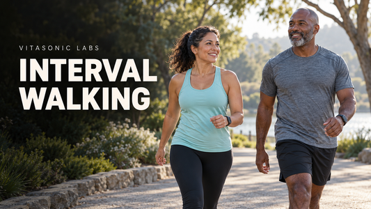 Vitasonic Labs Interval Walking banner showing two adults walking purposefully along a park path.