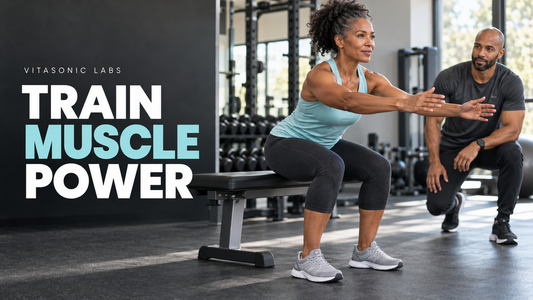 Vitasonic Labs Train Muscle Power banner showing a woman practicing a controlled sit-to-stand beside a trainer.