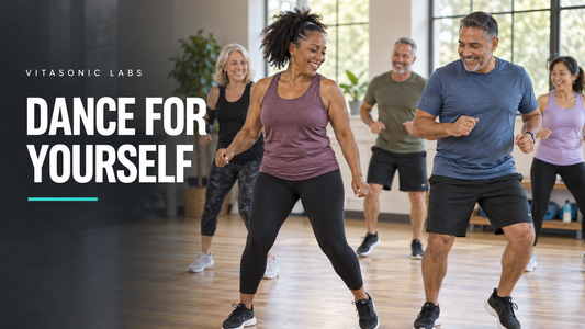 Vitasonic Labs Dance for Yourself banner with diverse adults doing simple dance steps in a bright community fitness class.